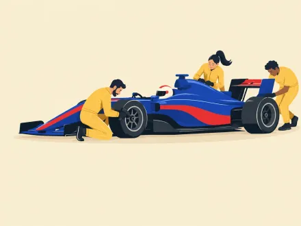 A pit crew working on a racing car