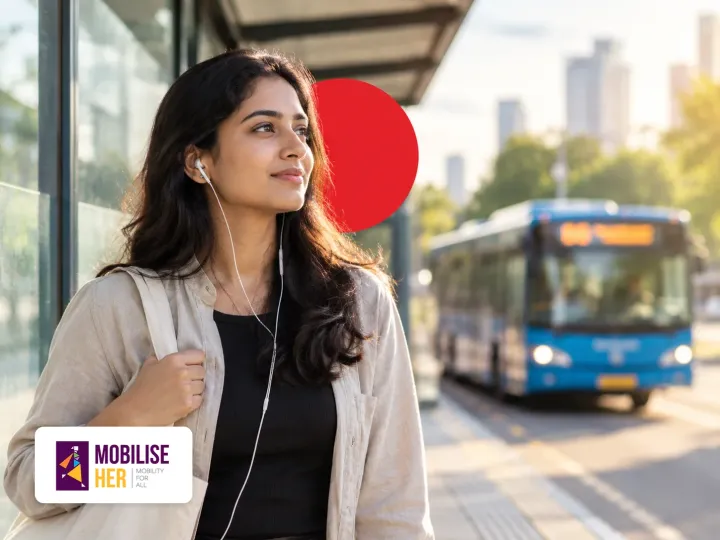 A commuter with earphones at a bus stop, with a bus behind her and the MobiliseHER logo